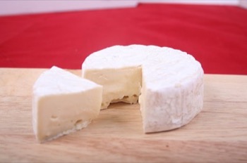 Brie on a wood surface